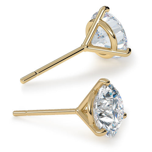 14k yellow gold diamond stud earrings with a 3 prong martini setting on a white background